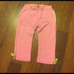 Pink Pants With Yellow Ruffles In The Back