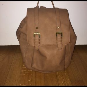 brown leather backpack