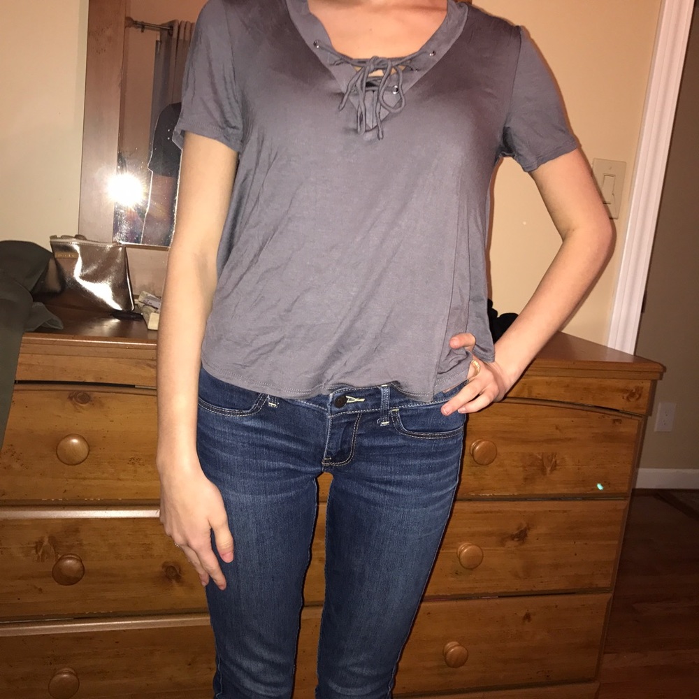 New with tags Very cute gray top. Flirty and sexy!