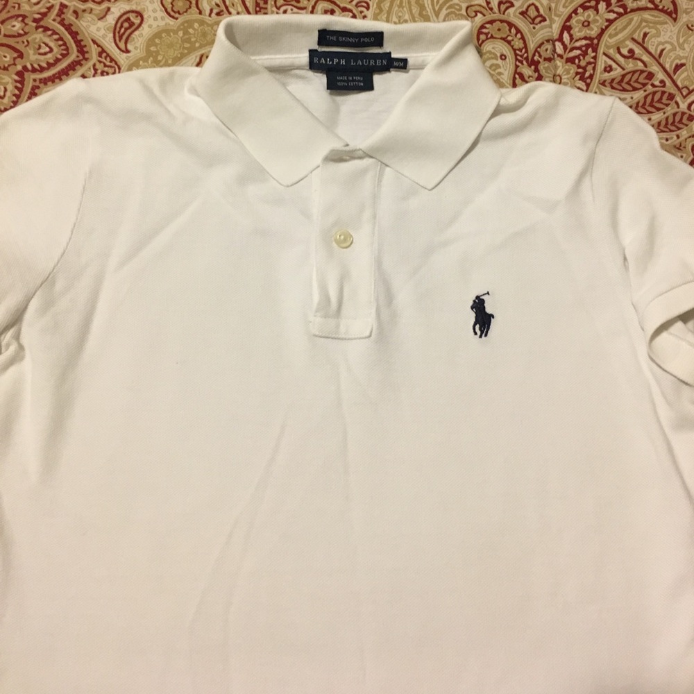 Women's white short sleeve polo.