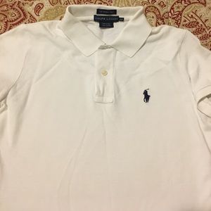 Women's white short sleeve polo.