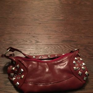 Red studded purse