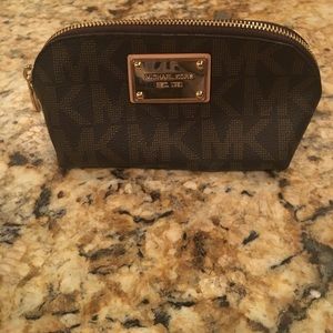 Never used Michael Kors brown/gold pouch