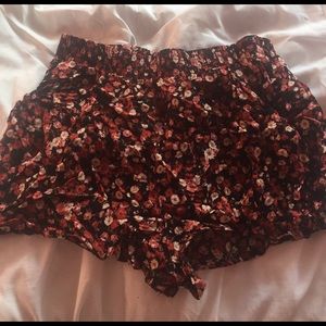 red floral shorts