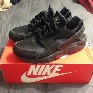 All black huaraches.