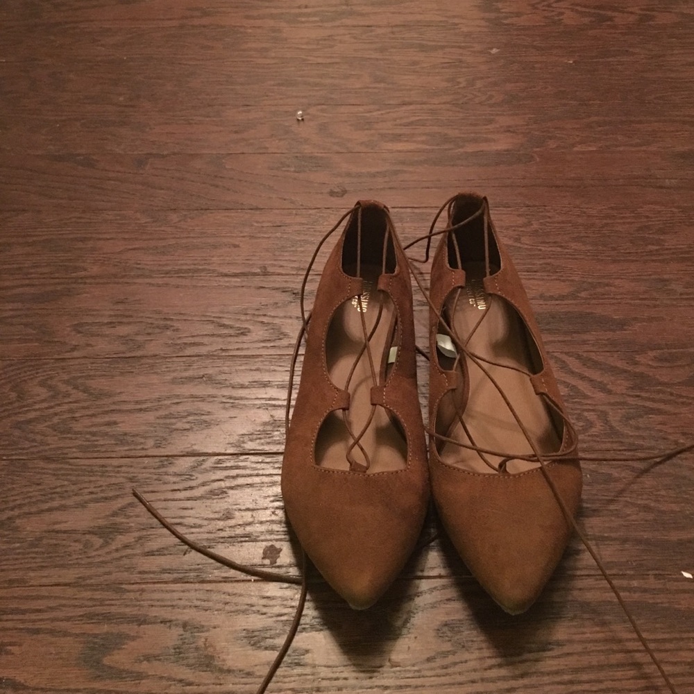 Tan suede strapped shoes