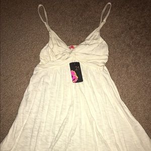 Spaghetti strap cream top. NWT
