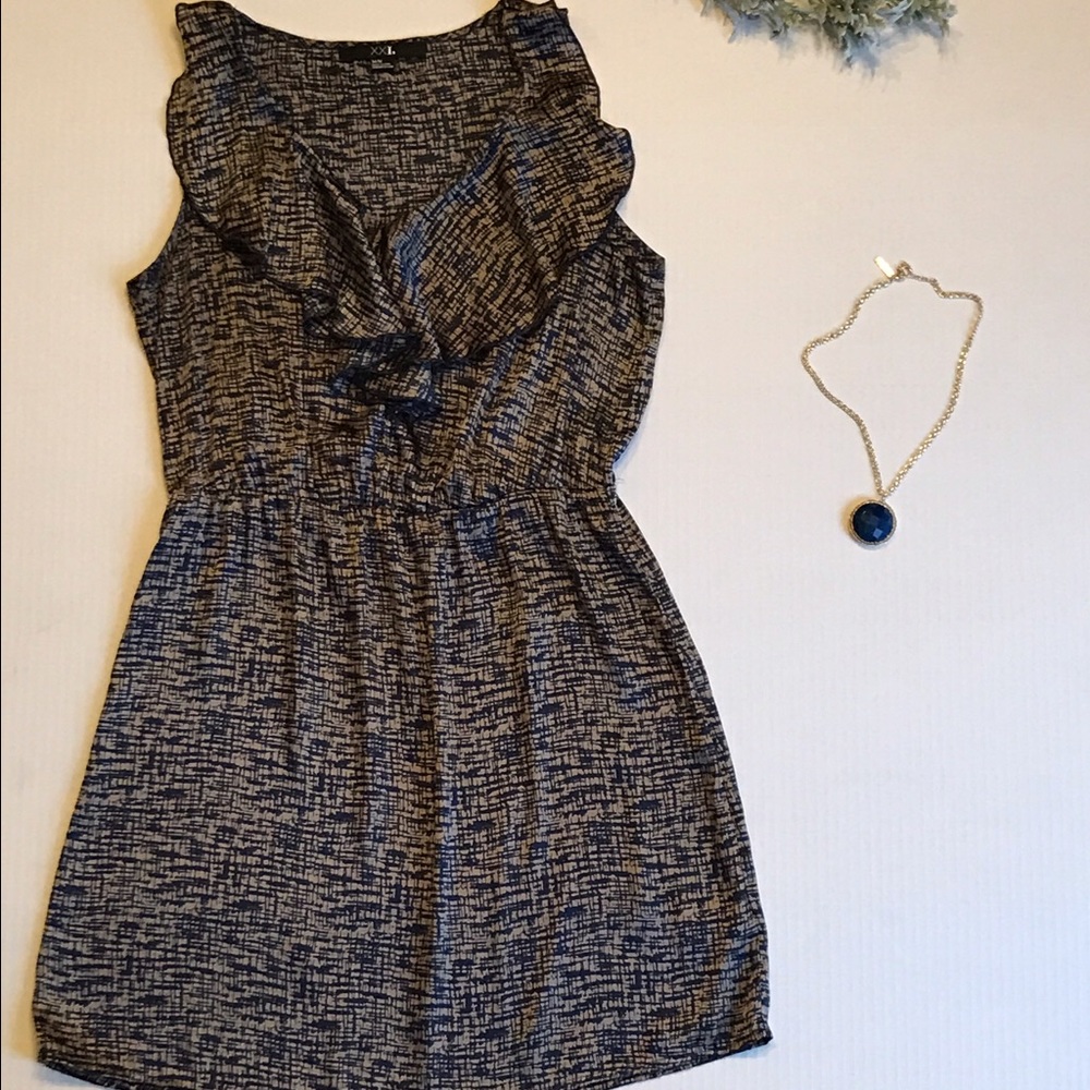 Sleeveless navy and gold dress with ruffle collar