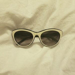 White and black horn rimmed sunglasses