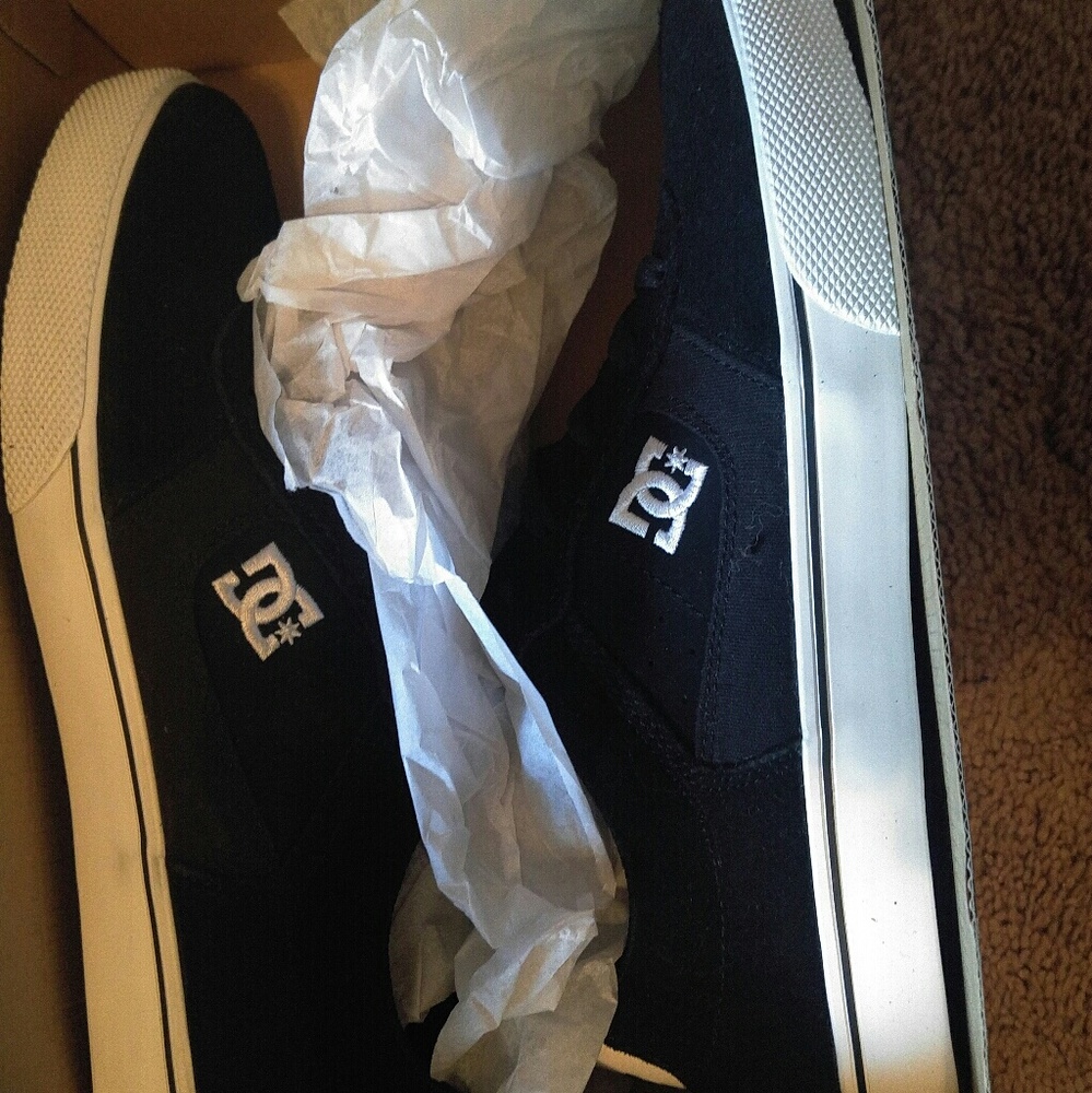 Brand new DC black sneakers