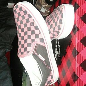 Checkerboard pink and black Vans