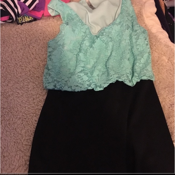 This is a tight dress with mini skirt and lace top - Picture 1 of 3