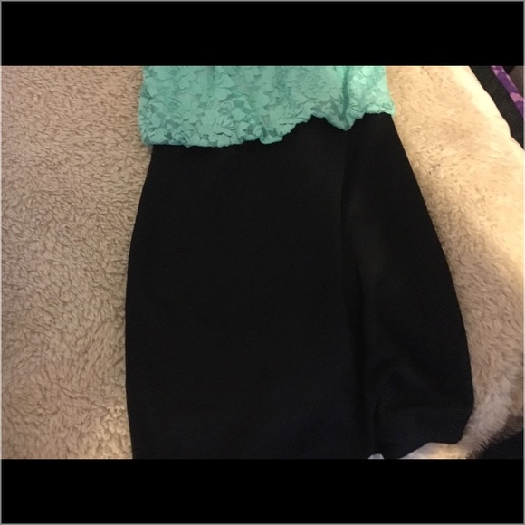 This is a tight dress with mini skirt and lace top - Picture 2 of 3