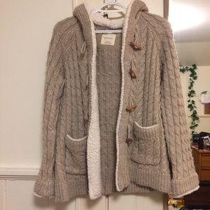Zara knitwear cardigan lines with sheepskin