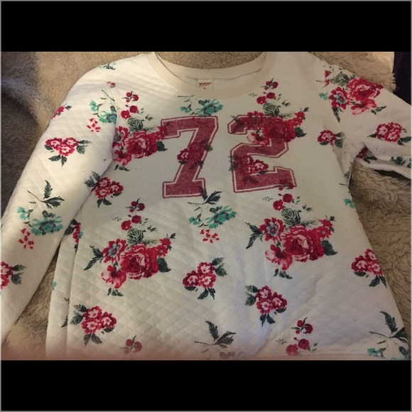 So this is a sweater shirt with flowers - Picture 1 of 2