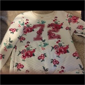 So this is a sweater shirt with flowers