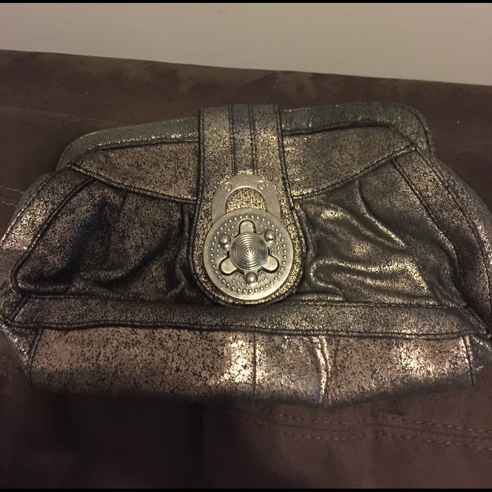 Clutch purse Metallic gold like new condition.