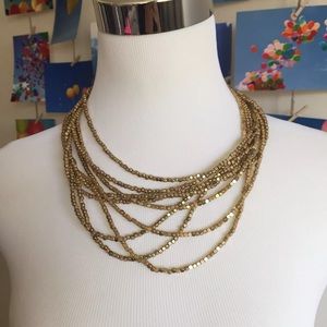 Off 5th Saks multi strand gold statement necklace!