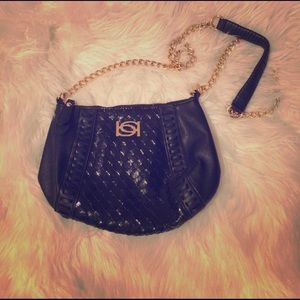 Black leather Bebe cross body bag.