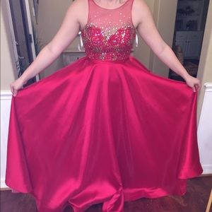 Red prom dress with detailed rose beading.
