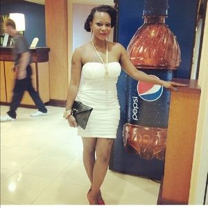 Strap less cream dress