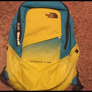 NWT lime green and blue North face backpack