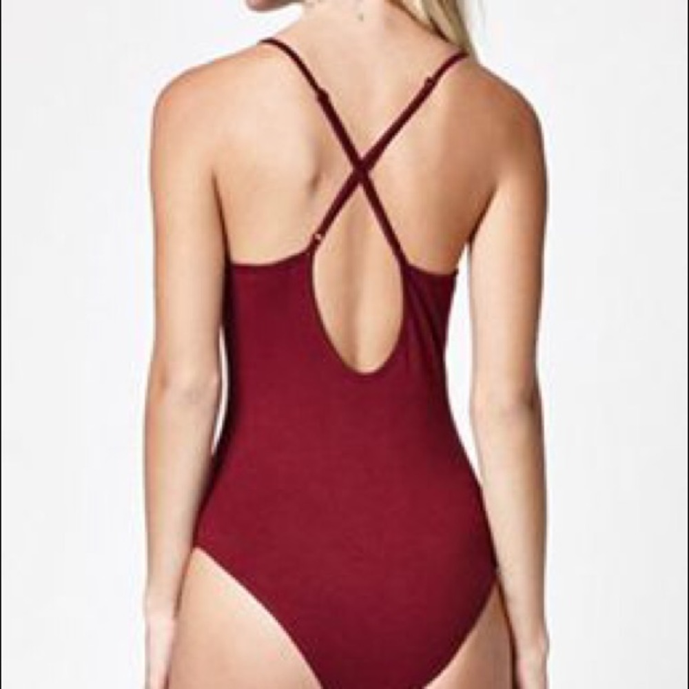 Deep red v-neck bodysuit with crossed back