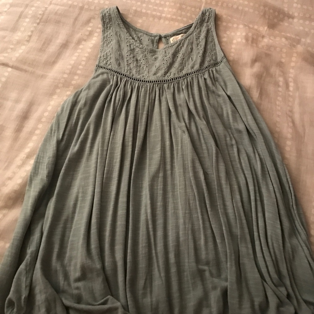 Mint green flowy shirt. Worn one time!