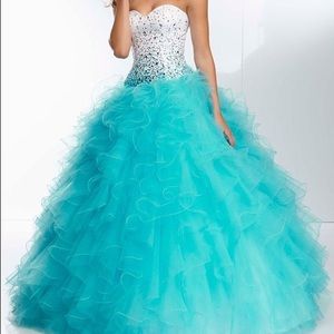 White corset top teal crystals with ruffled gown