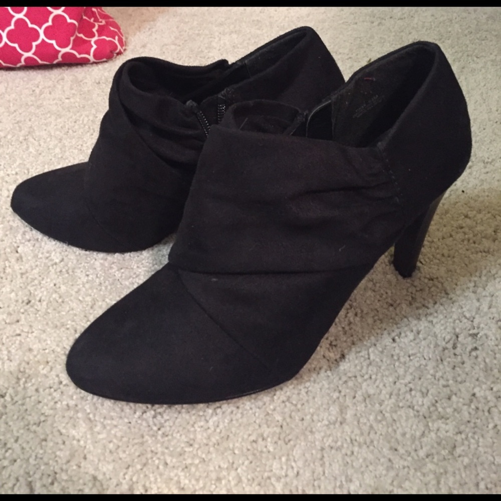 Black suede heels gently worn