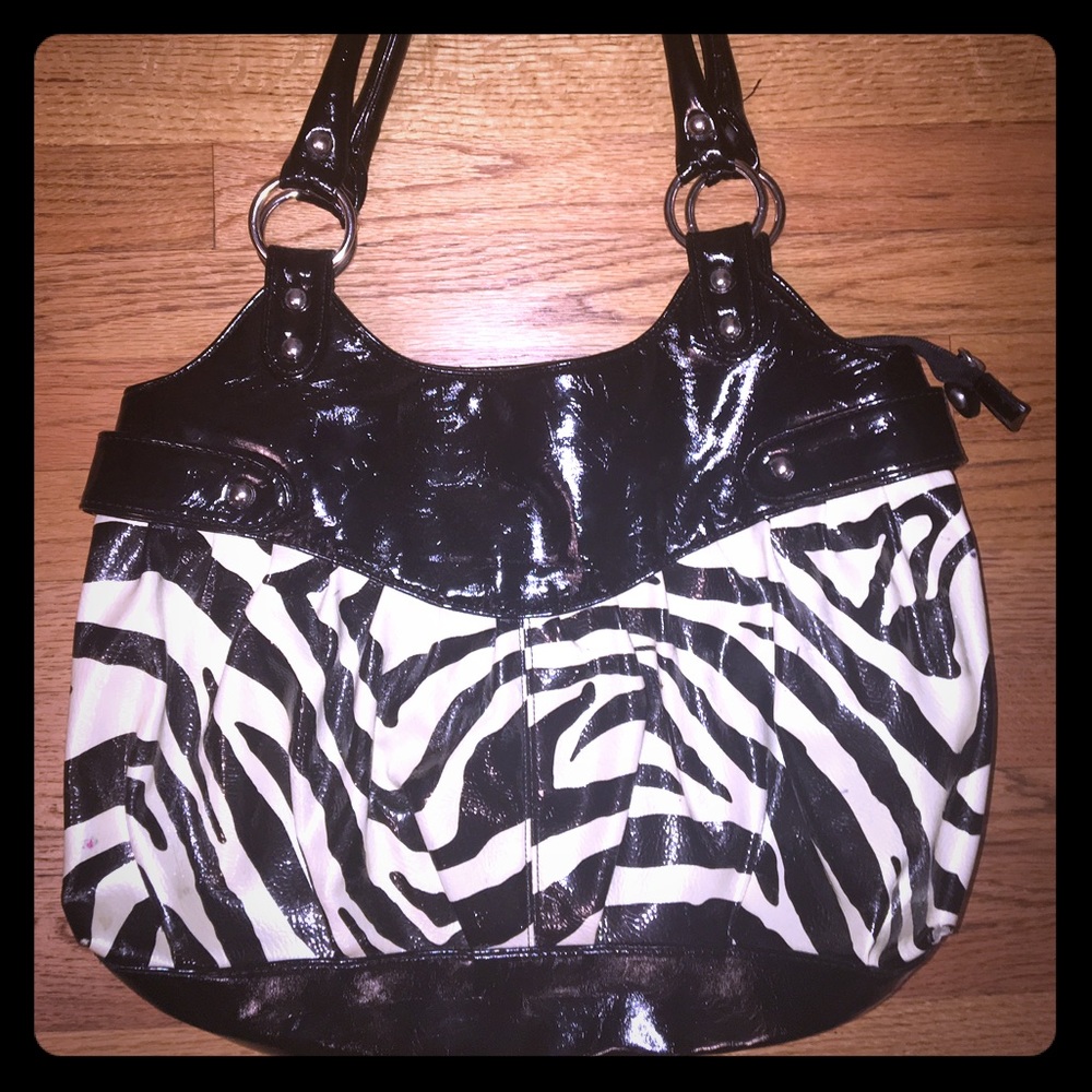 Zebra print aldo purse.