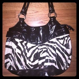 Zebra print aldo purse.