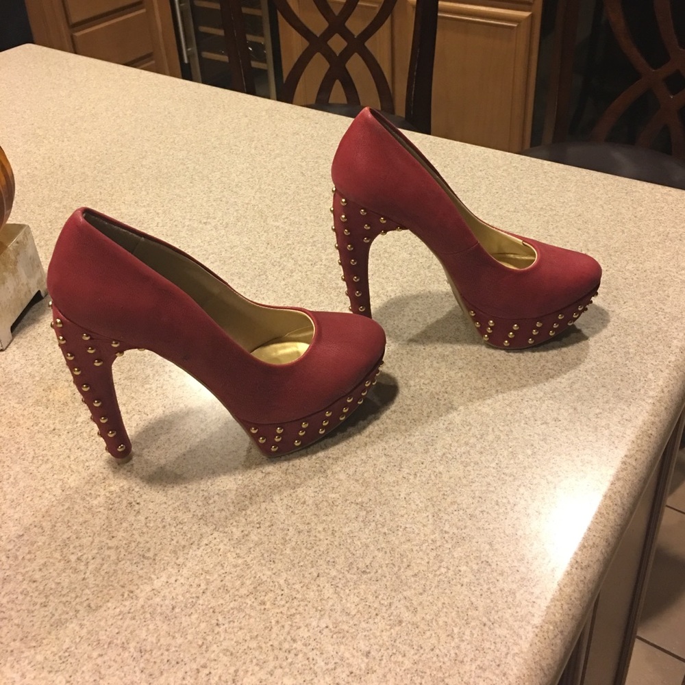 Red heels with gold studs