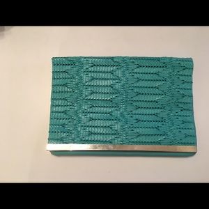 Turquoise clutch bag