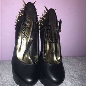 Spiked black leather heels