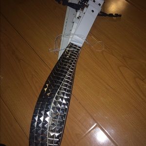 White and silver leather studded belts