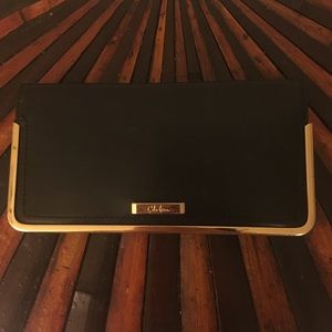 Cole Haan black leather & gold metal trim wallet