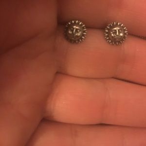 Sterling Silver Sun post earrings of a sun