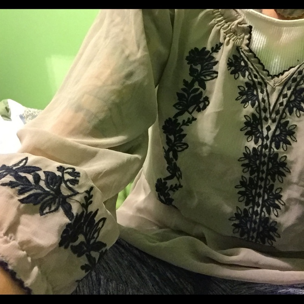 sheer quarter length flirty top