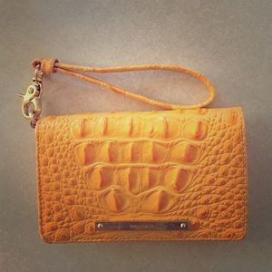 Brahmin wristlet in fun orange leather.