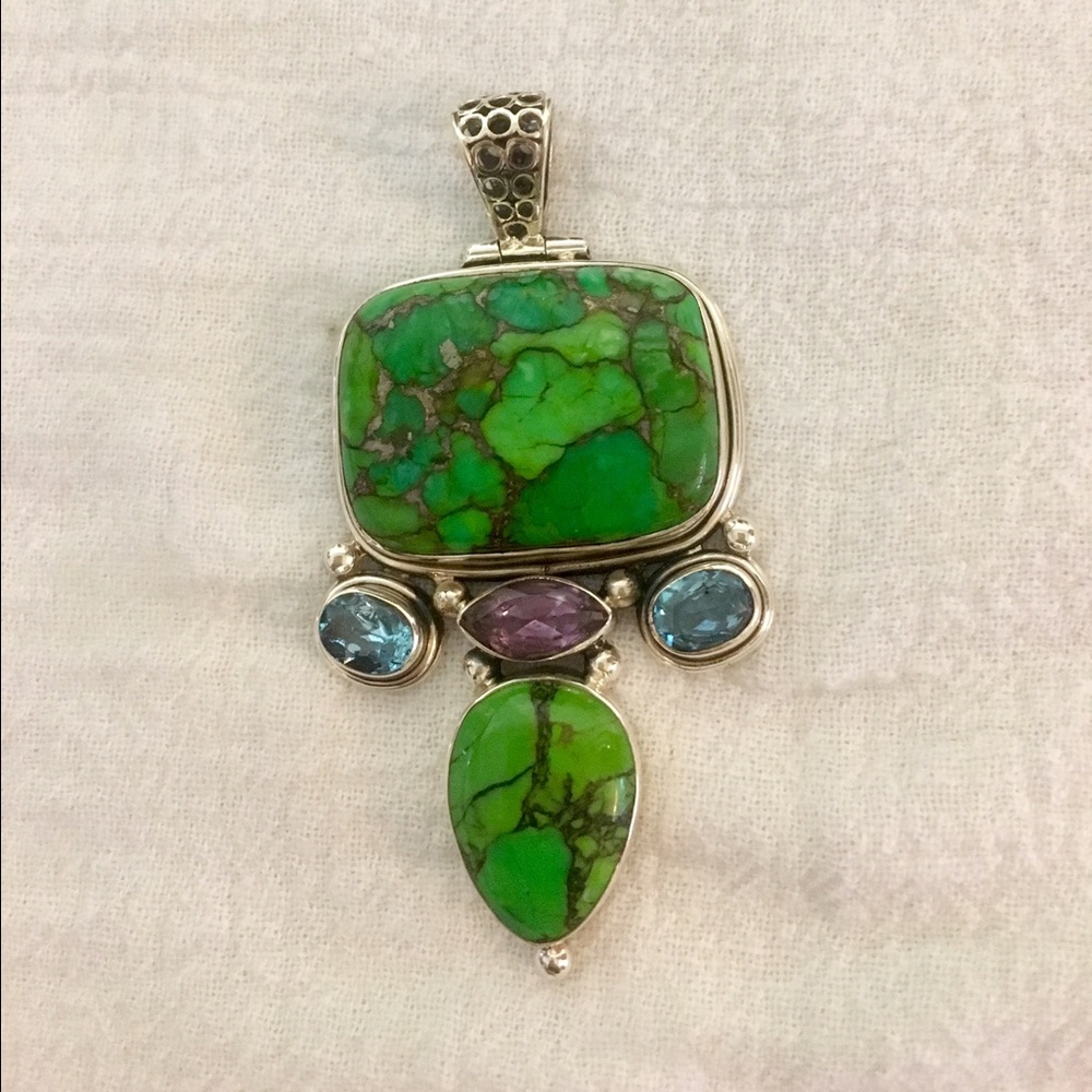 Turquoise and gemstone silver pendant.
