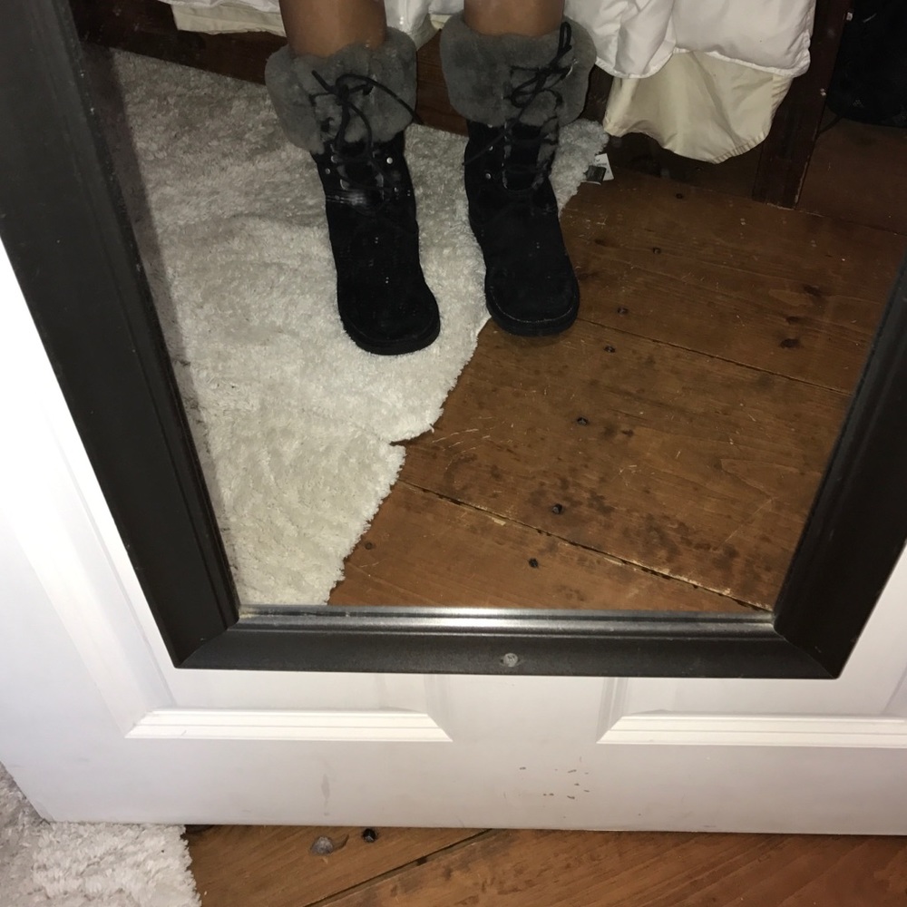 Black uggs!! Lace up and fluffy details
