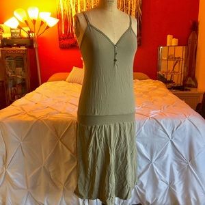Green form fitting material, spaghetti strap dress