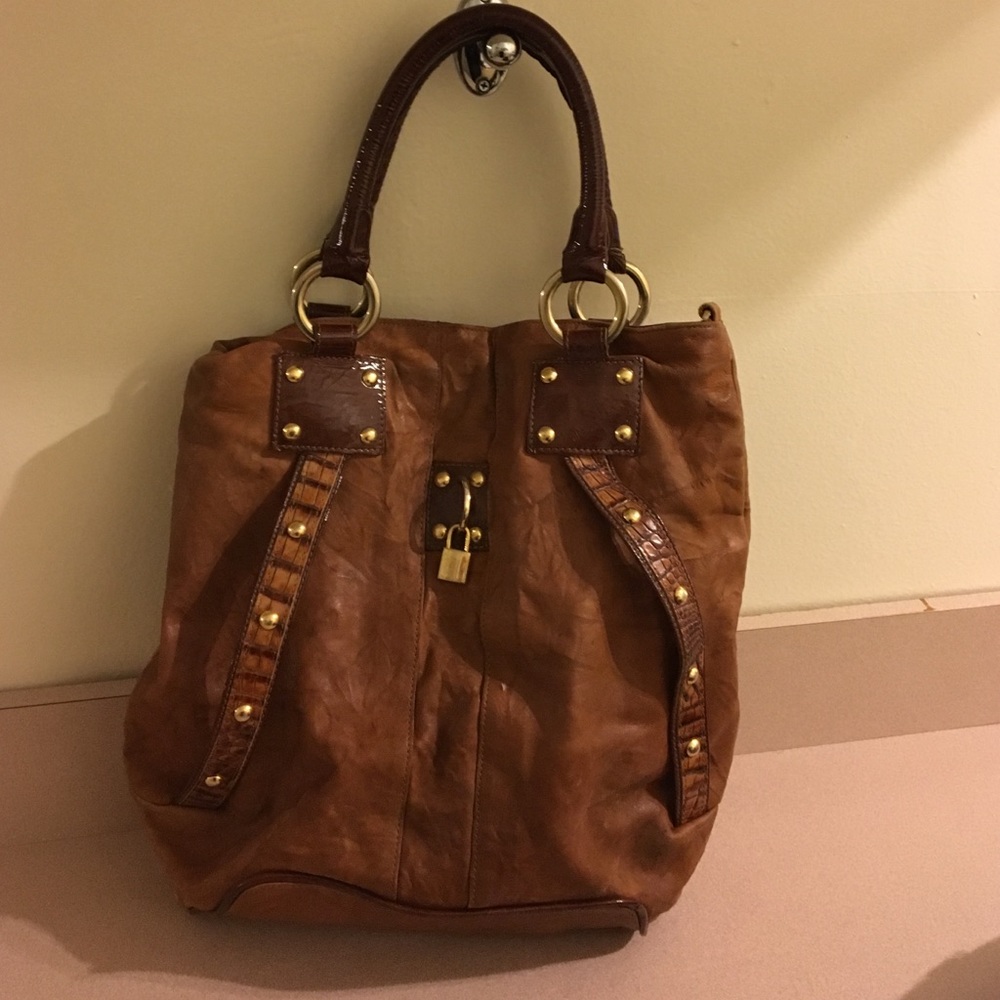 Leather and gold design handbag