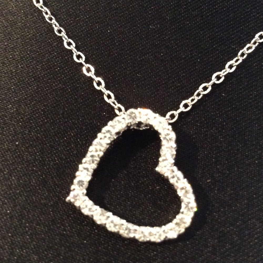 Silver tone necklace with silver crytal heart