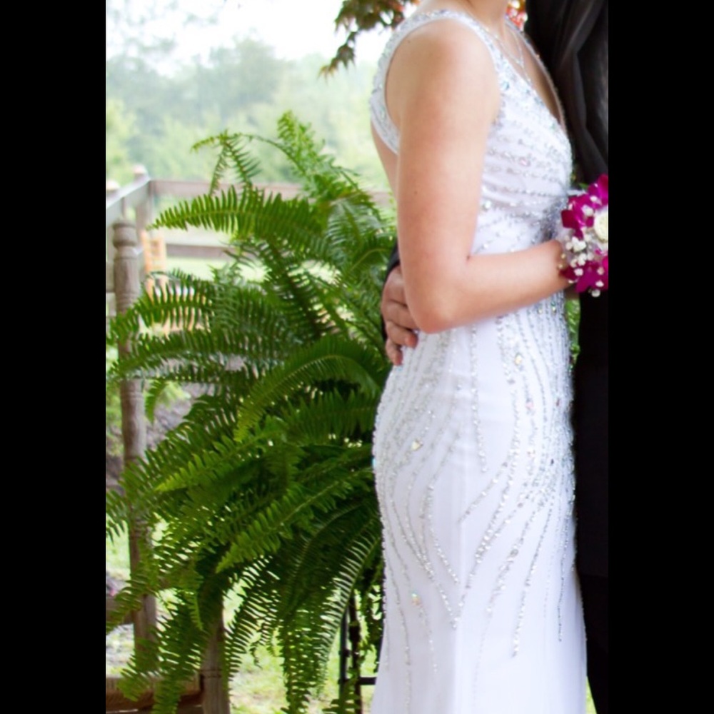White Sean collection prom dress from Merle Norman
