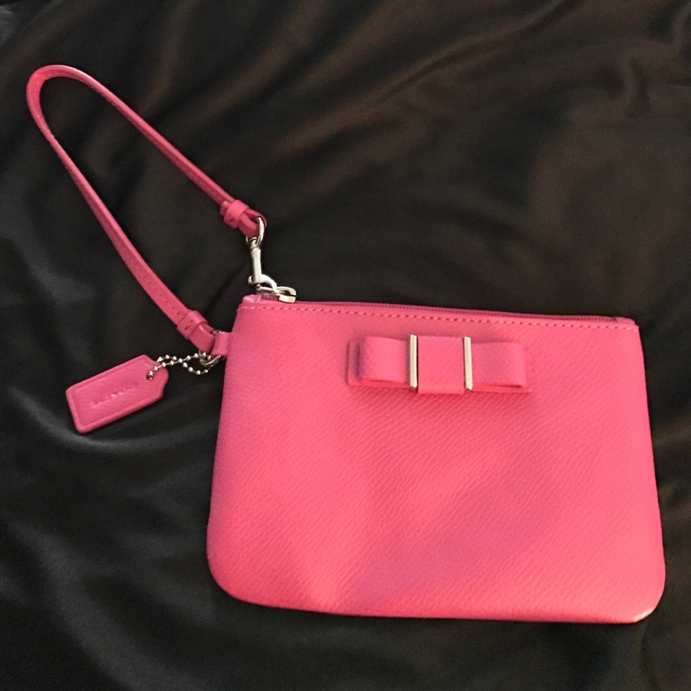 Pink COACH wristlet never used
