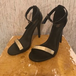 BLACK AND GOLD HEELS