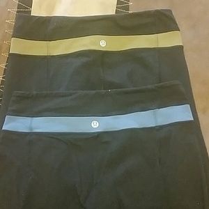 2 pairs of black lulu lemon pants