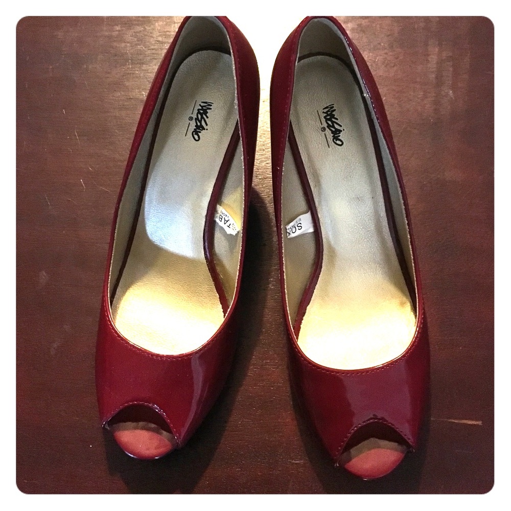 Good condition patent red heels